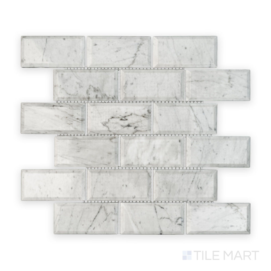 Tile showcase of White Carrara Marble 2x4 brick beveled polished mosaic highlighting glossy marble bricks with beveled edges for a modern look