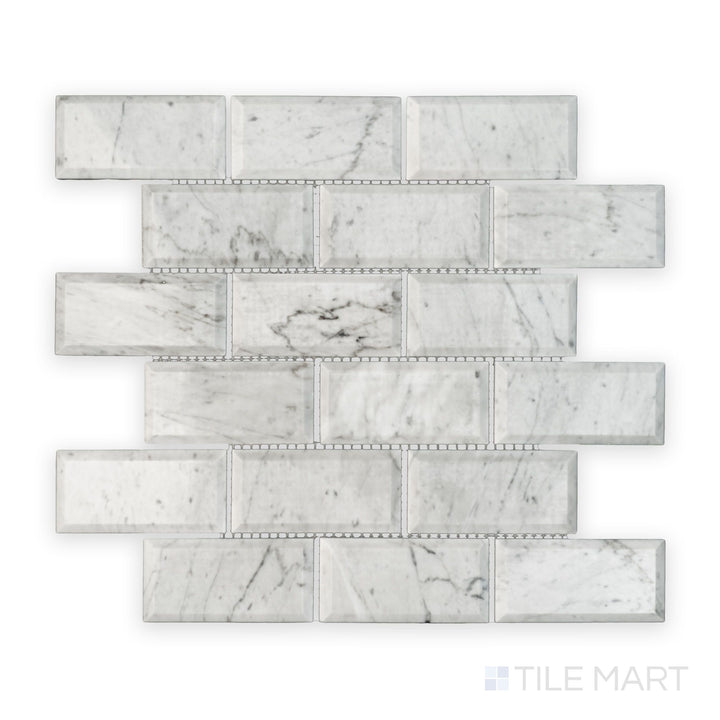 Tile showcase of White Carrara Marble 2x4 brick beveled polished mosaic highlighting glossy marble bricks with beveled edges for a modern look
