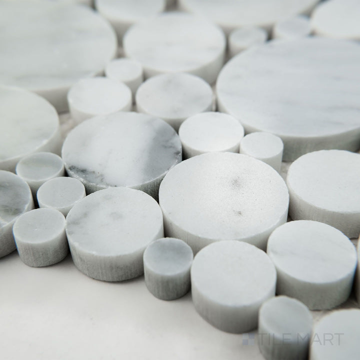 Corner view of White Carrara Marble bubble polished mosaic featuring glossy marble circles for a bright and elegant design