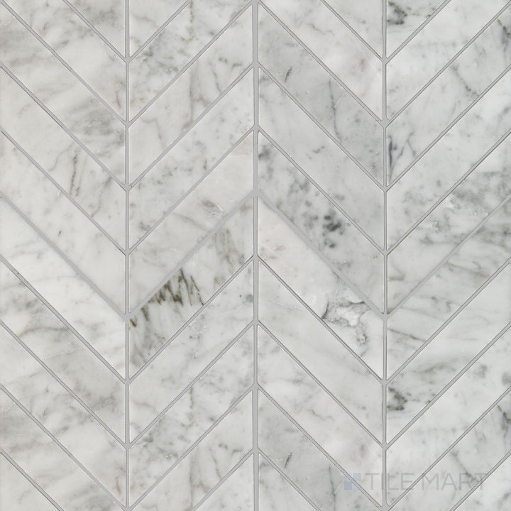 Flat overhead image of White Carrara Marble 1x4 chevron honed mosaic tile, showcasing elegant angled cuts with a soft matte finish for stylish walls