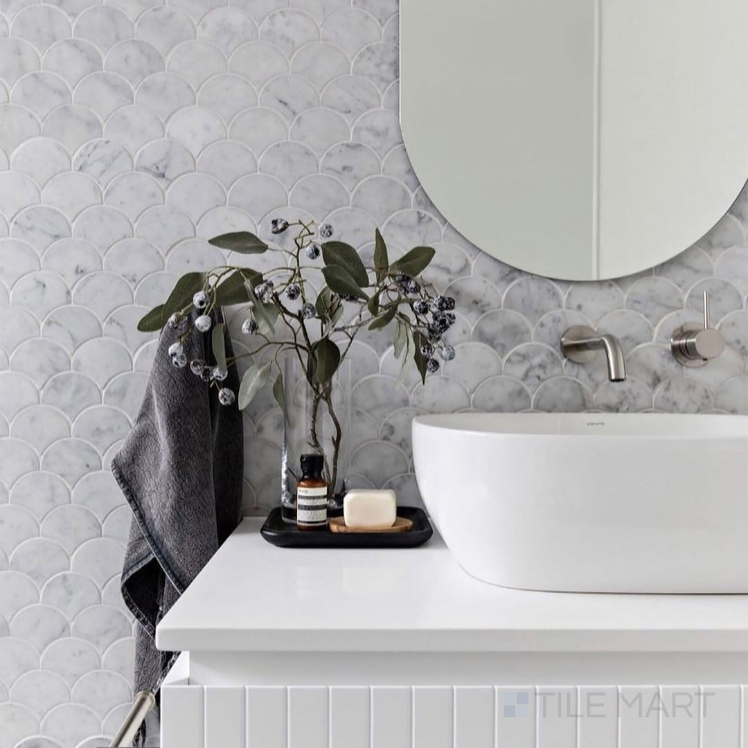 White Carrara Marble 1" Fan Honed Mosaic lends a timeless, graceful element to a sophisticated showcase setting