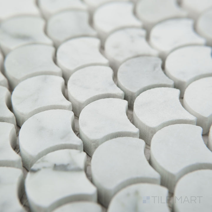 Corner view of White Carrara Marble 1" fan honed mosaic highlighting small matte marble fan shapes arranged in a flowing design
