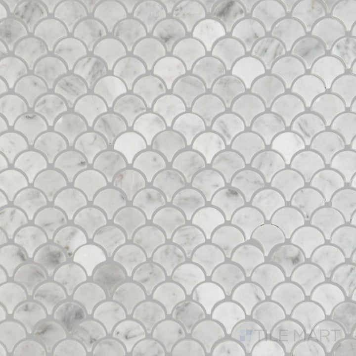 Top-down image showing White Carrara Marble 1-inch fan polished mosaic, featuring bright polished marble fans arranged in a graceful arch pattern