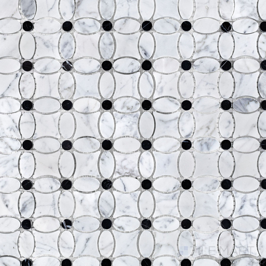 Flat lay of White Carrara Marble flower mosaic with Negro Marquina accents, combining soft white marble petals and dark centers for elegant design