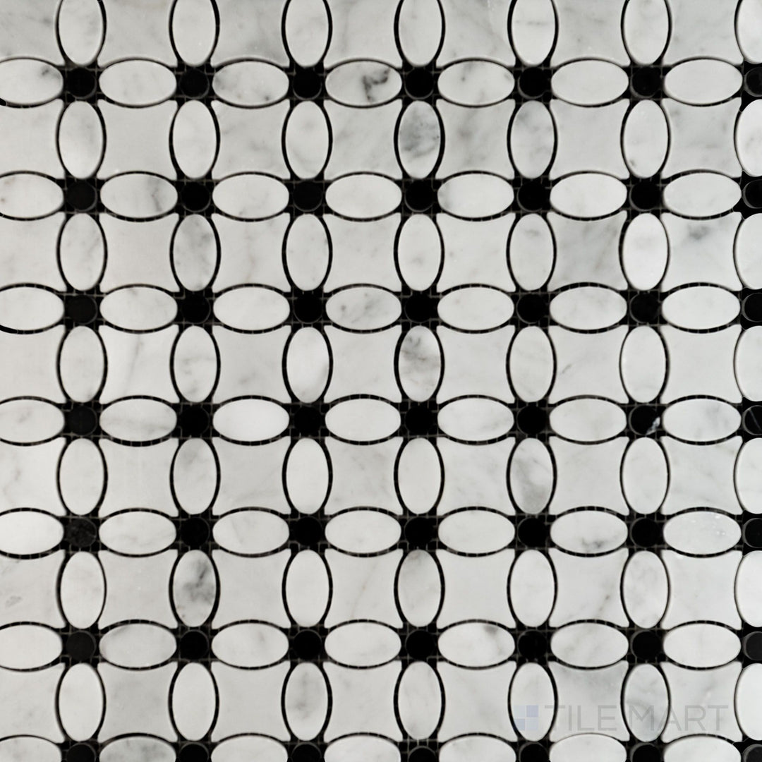 Top-down view of White Carrara Marble flower mosaic with Negro Marquina polished accents, showcasing elegant marble petals and glossy dark centers