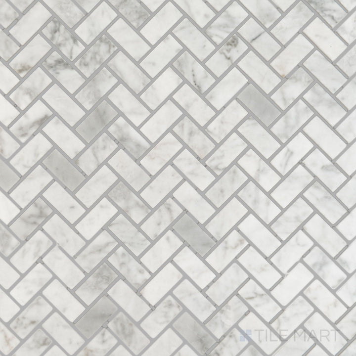 Flat overhead image of White Carrara Marble 5/8x1-1/4 herringbone polished mosaic, featuring glossy marble pieces arranged in a dynamic V-shaped pattern