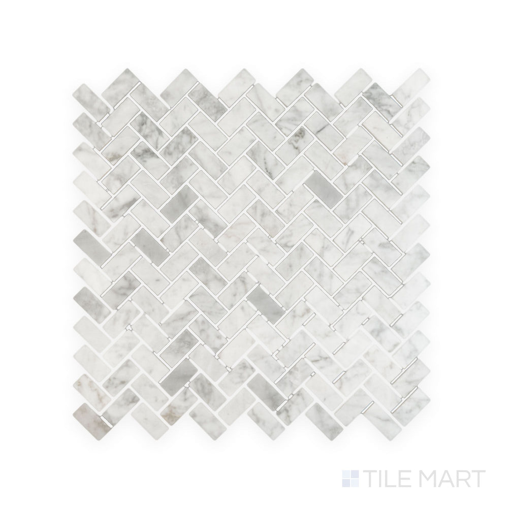 Tile arrangement of White Carrara Marble 5/8x1-1/4 herringbone polished mosaic featuring small glossy marble pieces laid in a sharp V-pattern