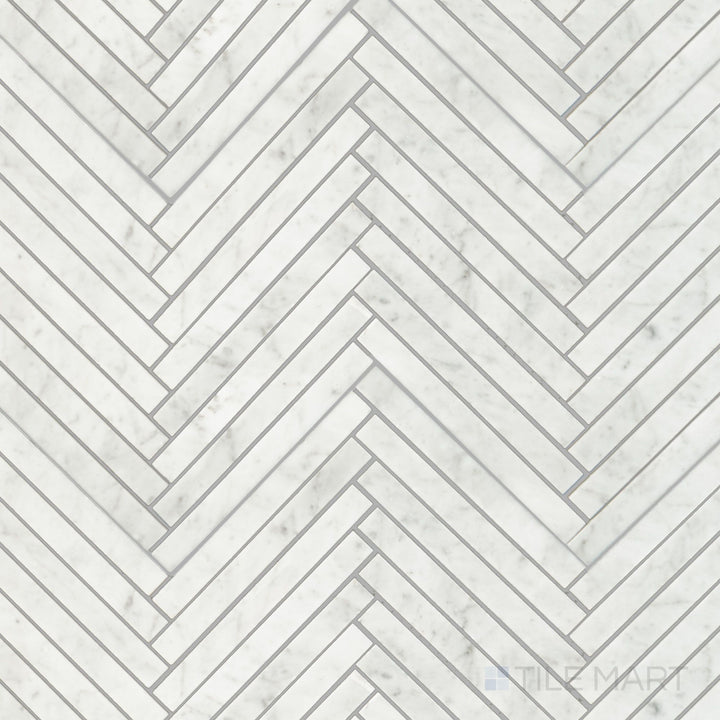 Top view of White Carrara Marble 5/8x6 herringbone honed mosaic, showing soft matte marble tiles laid in a classic zigzag layout for stylish walls or floors