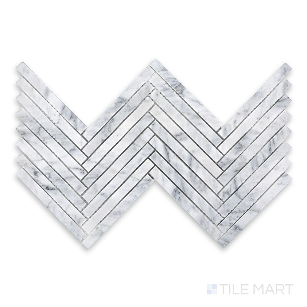 Sheet view of White Carrara Marble 5/8x6 herringbone honed mosaic displaying long matte marble strips arranged in a classic zigzag layout