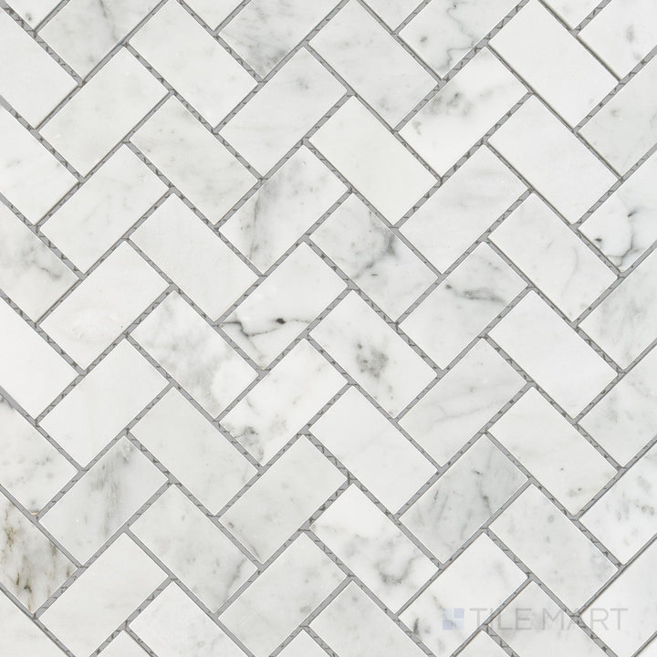 Overhead perspective of White Carrara Marble 1x2 herringbone polished mosaic, showcasing polished marble strips in a vibrant classic herringbone layout