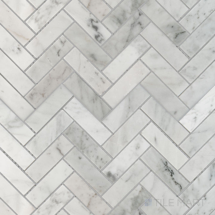 Flat overhead image showing White Carrara Marble 1x3 herringbone polished mosaic, with glossy marble pieces woven into a traditional herringbone layout