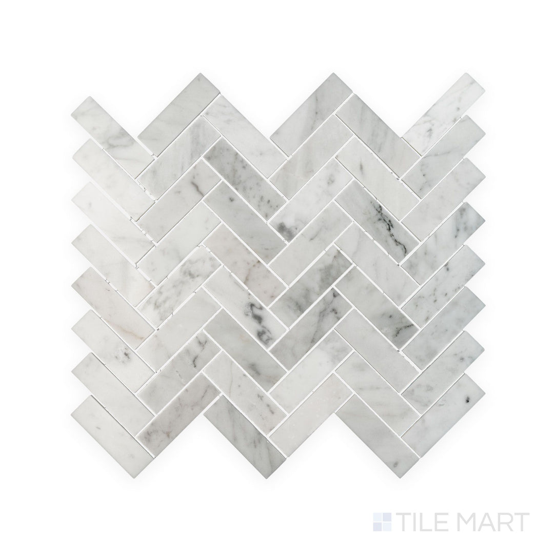 Tile showcase of White Carrara Marble 1x3 herringbone polished mosaic highlighting sleek glossy marble pieces in a classic herringbone weave