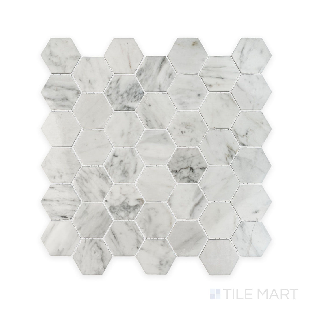 Complete view of White Carrara Marble 2" hexagon polished mosaic showing bright polished marble hexagons arranged for modern wall or floor designs