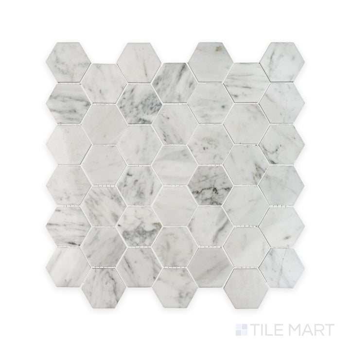 Complete view of White Carrara Marble 2" hexagon polished mosaic showing bright polished marble hexagons arranged for modern wall or floor designs