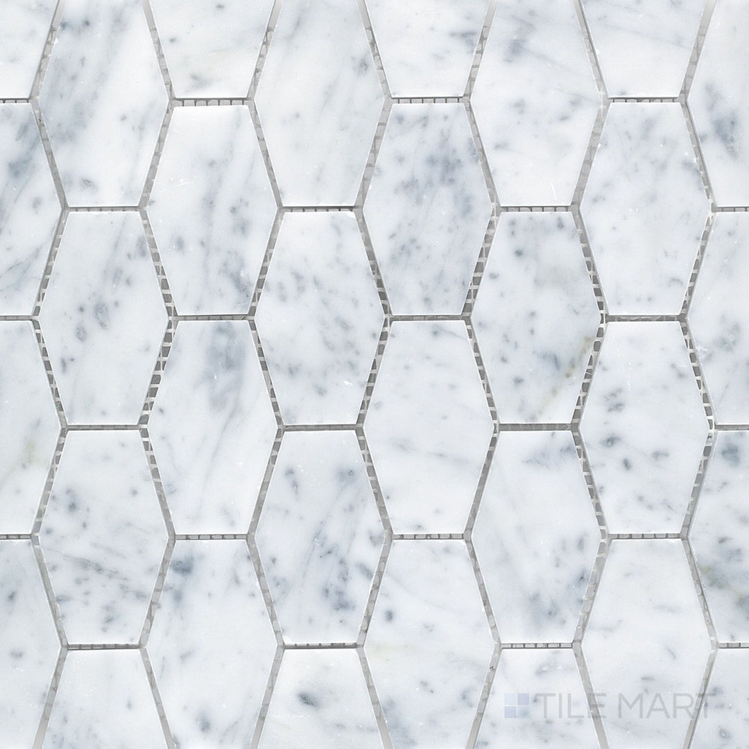 Top-down view of White Carrara Marble elongated hexagon honed mosaic, featuring slim matte marble shapes arranged in a sleek, modern pattern
