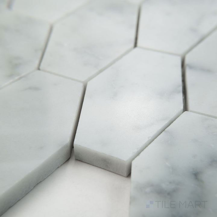 Tile corner display of White Carrara Marble elongated hexagon polished mosaic featuring glossy marble tiles with an elongated hexagon shape