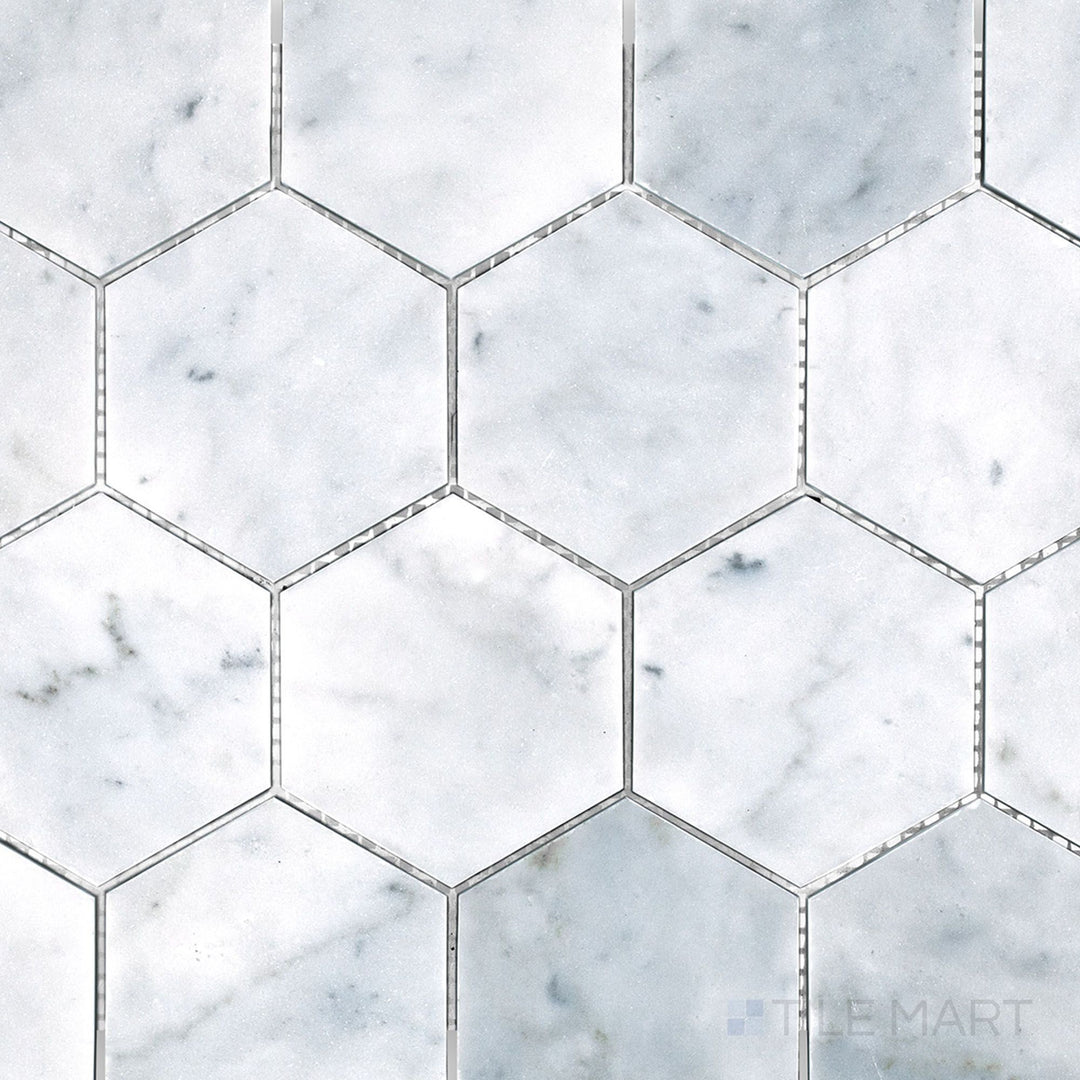 Top view of White Carrara Marble 3-inch hexagon honed mosaic, highlighting large matte marble hexagons perfect for timeless geometric surfaces