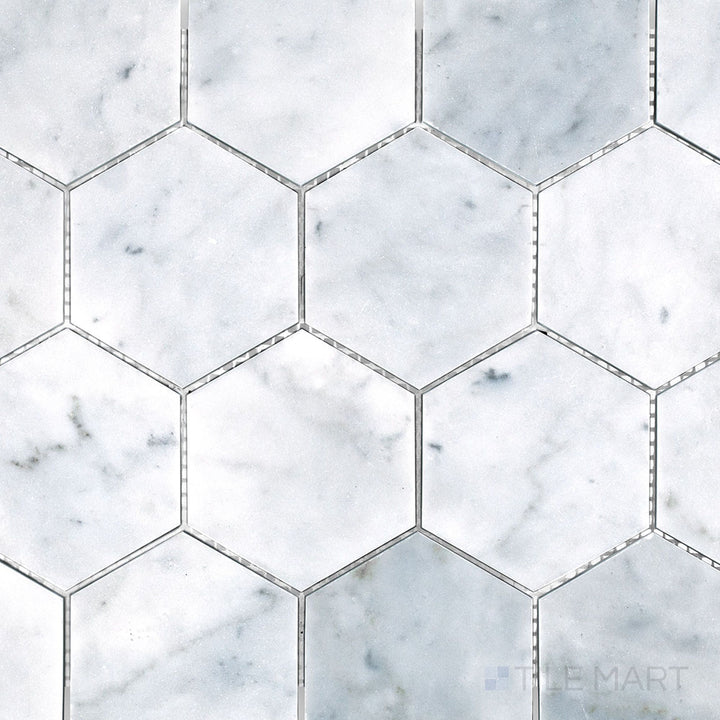 Top view of White Carrara Marble 3-inch hexagon honed mosaic, highlighting large matte marble hexagons perfect for timeless geometric surfaces