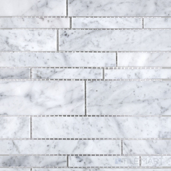 Top-down image of White Carrara Marble linear honed mosaic, featuring slim matte marble pieces aligned in an elegant, minimalist pattern
