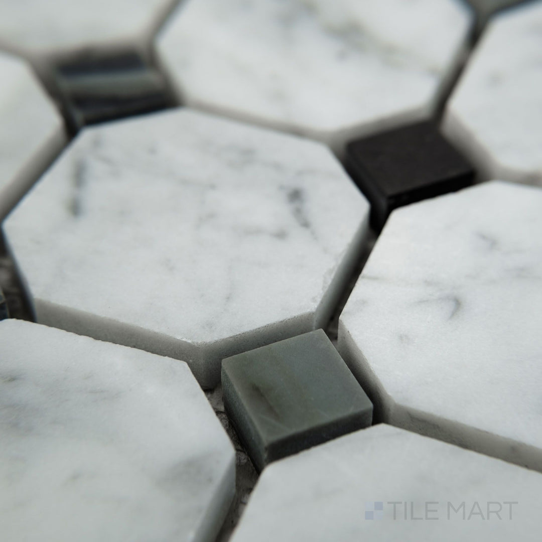 Angled view of White Carrara Marble octagon with blue dot honed mosaic featuring soft matte marble and subtle blue accents