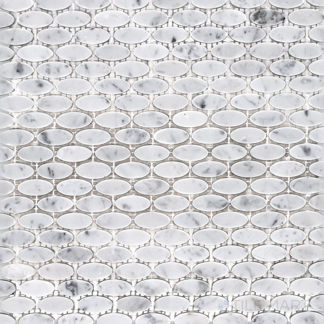 Overhead perspective of White Carrara Marble oval honed mosaic, featuring smooth marble ovals with a soft textured finish for organic wall or floor designs