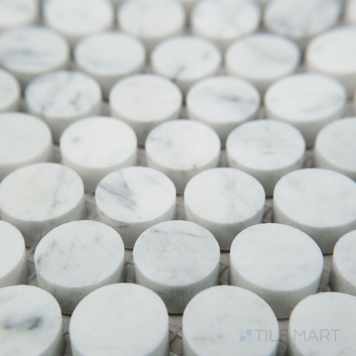 Tile corner display of White Carrara Marble penny round honed mosaic highlighting matte marble circles in a playful and classic layout