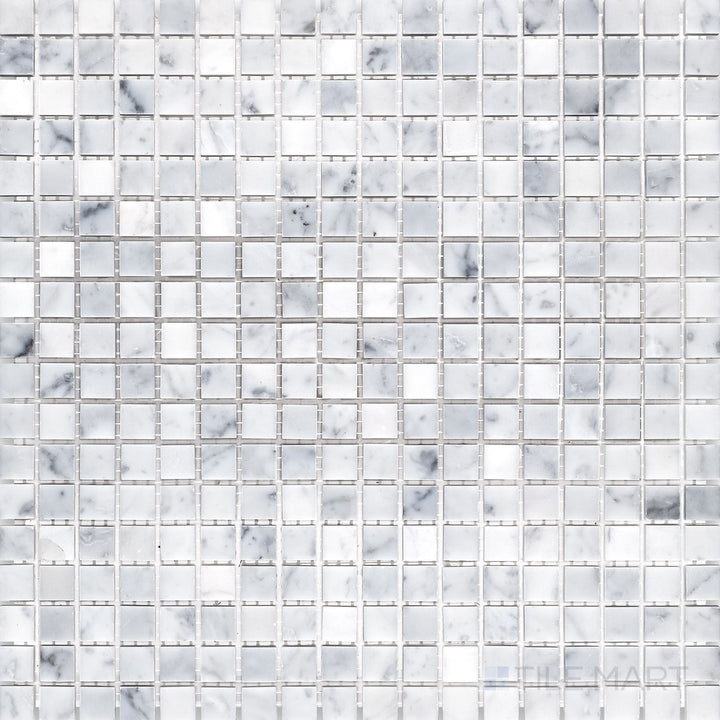 Top-down view of White Carrara Marble 5/8" square honed mosaic, featuring small matte marble squares laid in a neat, clean grid