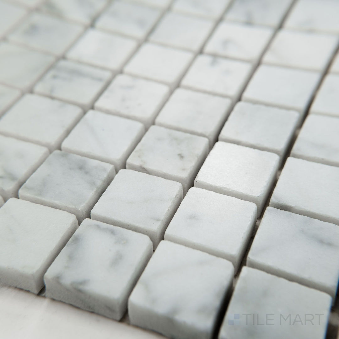 Angled view of White Carrara Marble 3/4" square polished mosaic showcasing shiny marble squares arranged tightly for a polished, elegant effect