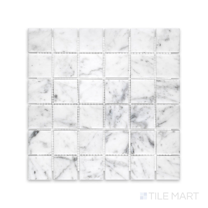 Full view from above of White Carrara Marble 2" square honed mosaic highlighting larger matte marble squares arranged in a neat grid