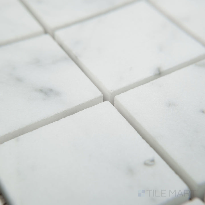 Corner view of White Carrara Marble 2" square honed mosaic showing smooth matte marble squares for a timeless, clean design