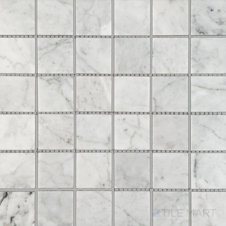 Flat top view of White Carrara Marble 2" square polished mosaic, displaying glossy marble squares arranged for bold and elegant interiors