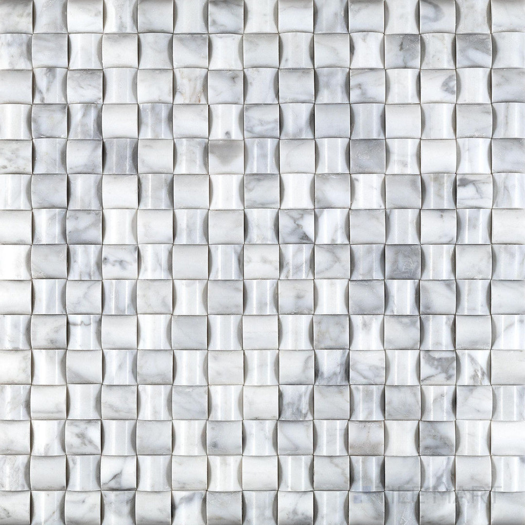 Overhead shot of White Carrara Marble 3D bread polished mosaic, featuring dimensional polished marble patterns for a striking wall accent