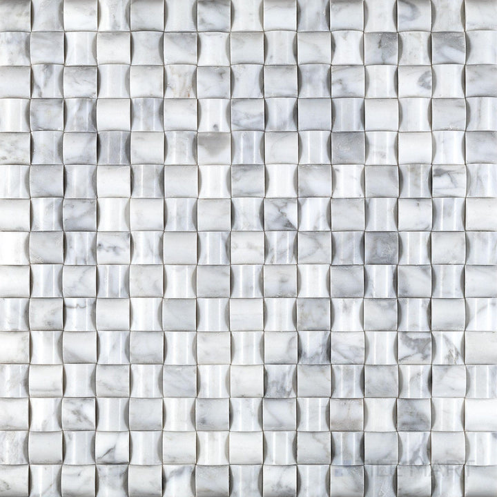 Overhead shot of White Carrara Marble 3D bread polished mosaic, featuring dimensional polished marble patterns for a striking wall accent