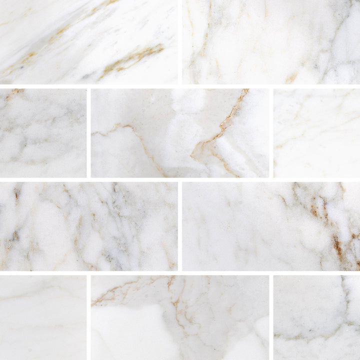 Calacatta Gold Marble 3X6 tiles with a polished finish shown in a full layout view, emphasizing their natural sheen and color range.