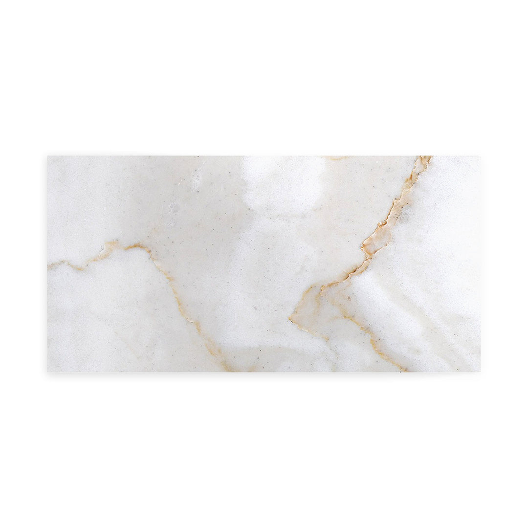 Polished Calacatta Gold Marble 3x6 tile captured from a top-down angle, featuring a glossy finish with luxurious golden veins ideal for refined interiors.