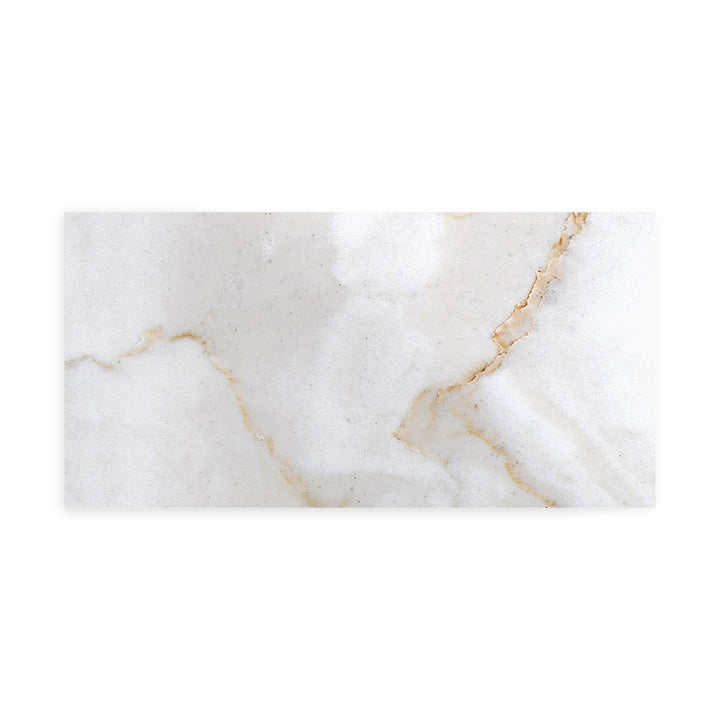 Polished Calacatta Gold Marble 3x6 tile captured from a top-down angle, featuring a glossy finish with luxurious golden veins ideal for refined interiors.