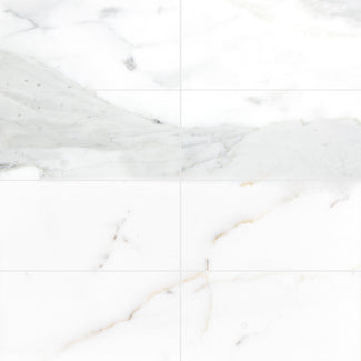 Calacatta Gold Marble 6X12 tiles in a honed finish laid out to showcase overall layout impression and natural stone variation.