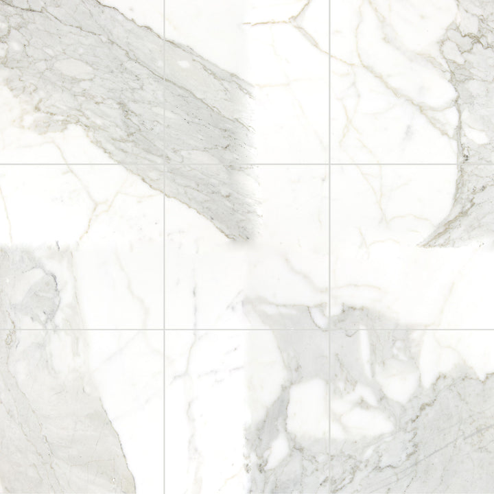 Overview of Calacatta Gold Marble 12X12 honed tiles arranged together to illustrate surface finish and natural variation.