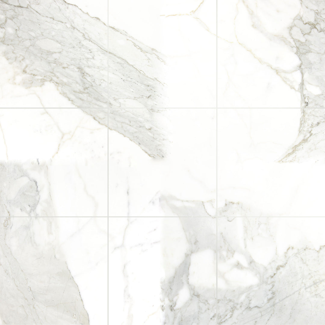 Overview shot of Calacatta Gold Marble 12x12 Polished Tile, featuring a reflective white surface with dramatic gold veining—perfect for upscale wall or floor settings.