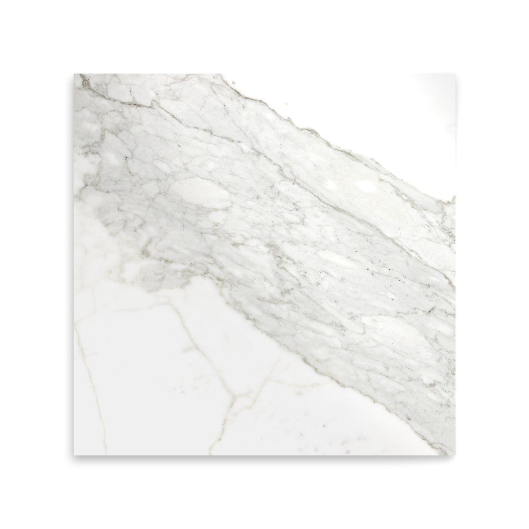 Polished Calacatta Gold Marble 12x12 tile shown from above, highlighting a radiant surface with signature golden veining across a white marble base.