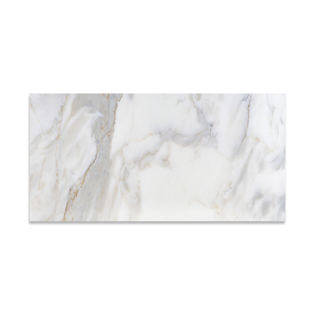 Top view of Calacatta Gold Marble 12x24 tile with a honed finish, featuring subtle gold and grey veining that adds depth to any design.