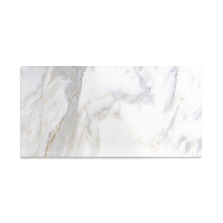 Seen from a top-down angle, the polished 12x24 Calacatta Gold Marble tile gleams with natural elegance and sophisticated golden accents.