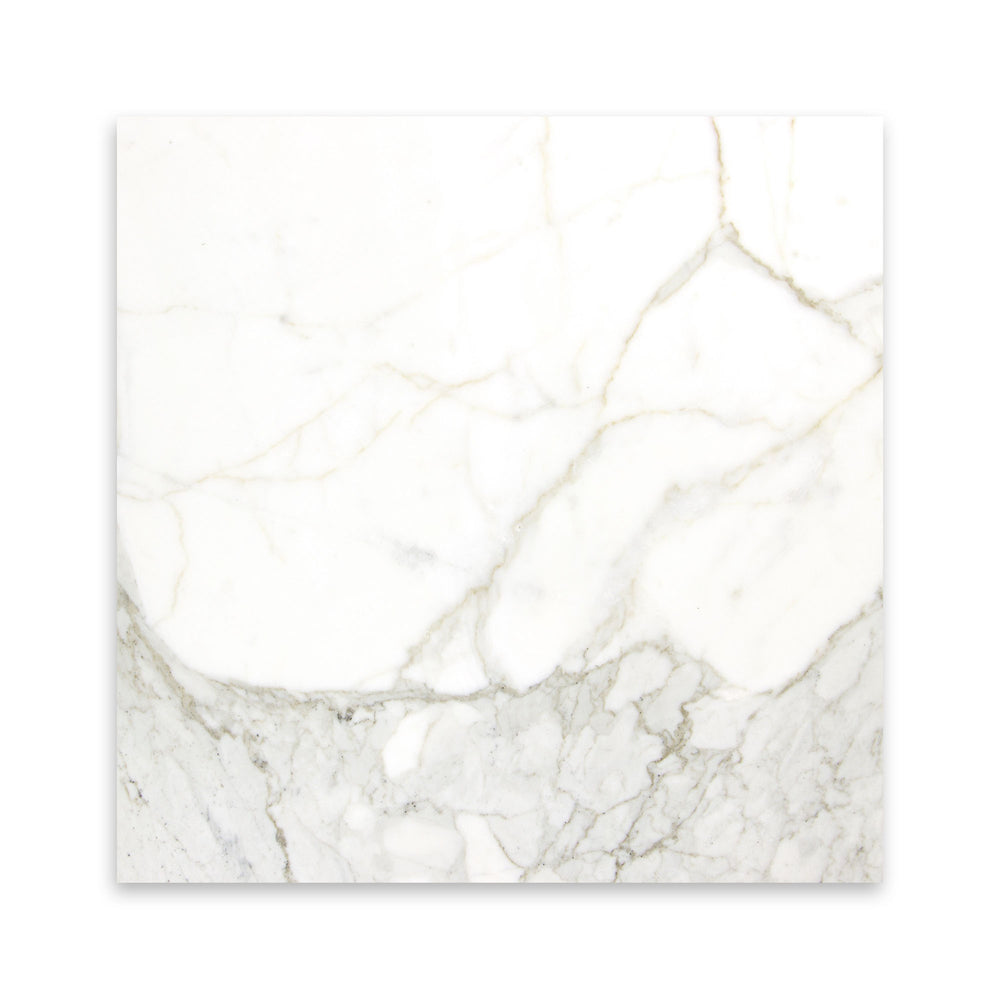 Overhead perspective of honed Calacatta Gold Marble tile in 18x18 size, offering a soft matte finish with striking veining patterns.