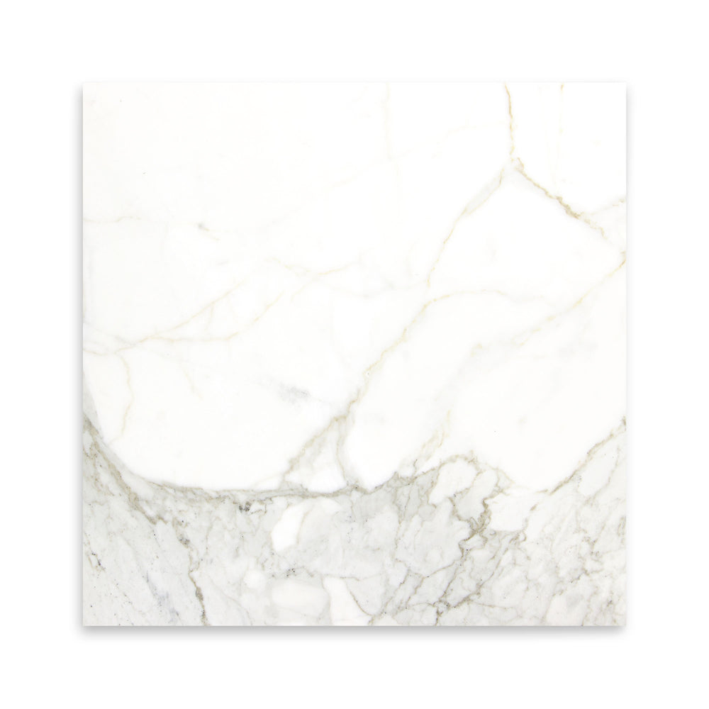 This polished 18x18 Calacatta Gold Marble tile is viewed from above, presenting a high-gloss surface with bold gold and grey marble streaks.