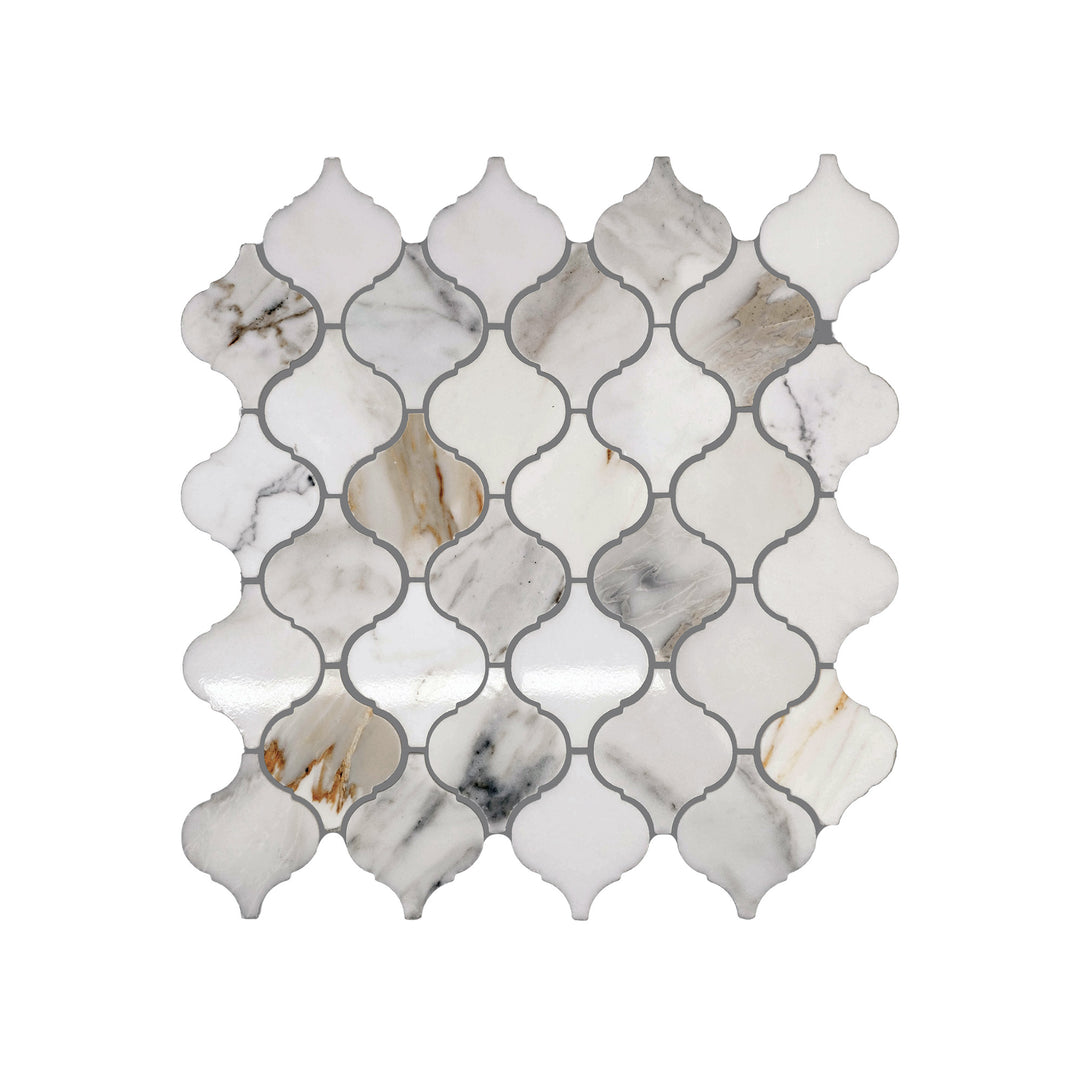Top-down view of Calacatta Gold Marble 4 inch Lantern Arabesque Mosaic with a honed finish, offering a soft matte surface with elegant curves and gold veining.