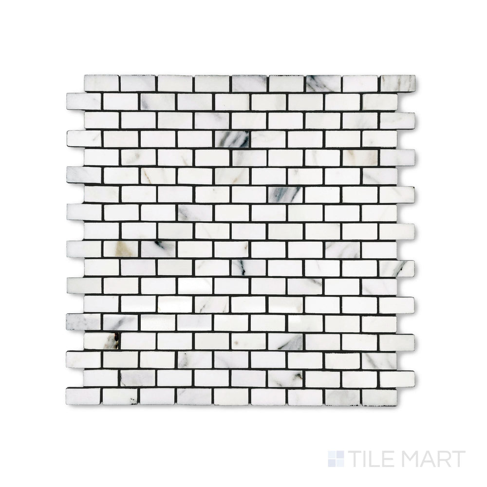 This top view displays a polished Calacatta Gold Marble brick mosaic in 5/8 by 1-1/4 inch size, delivering a sleek surface with classic veining.