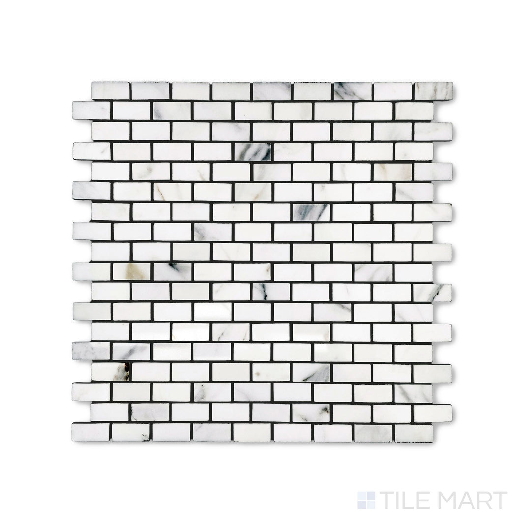 This top view displays a polished Calacatta Gold Marble brick mosaic in 5/8 by 1-1/4 inch size, delivering a sleek surface with classic veining.