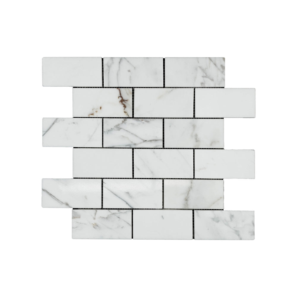 Polished Calacatta Gold Marble 2x4 brick mosaic viewed from above, capturing a glossy surface and refined brickwork ideal for classic designs.