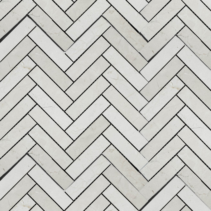 Full arrangement of Calacatta Gold Marble 1x4 polished herringbone mosaic showing glimmering finish and natural variation.