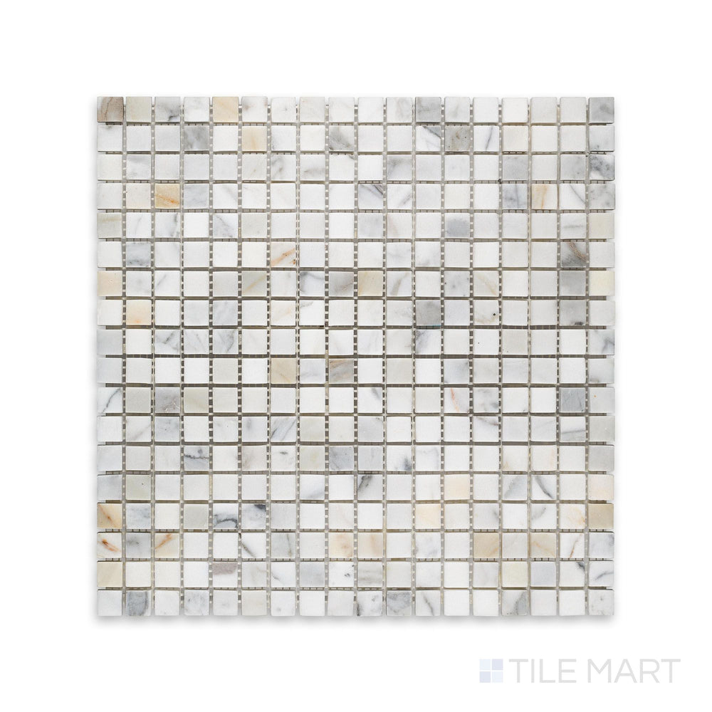 This 5/8 inch square mosaic in honed Calacatta Gold Marble is viewed from above, revealing tight grid layout and gentle matte finish.